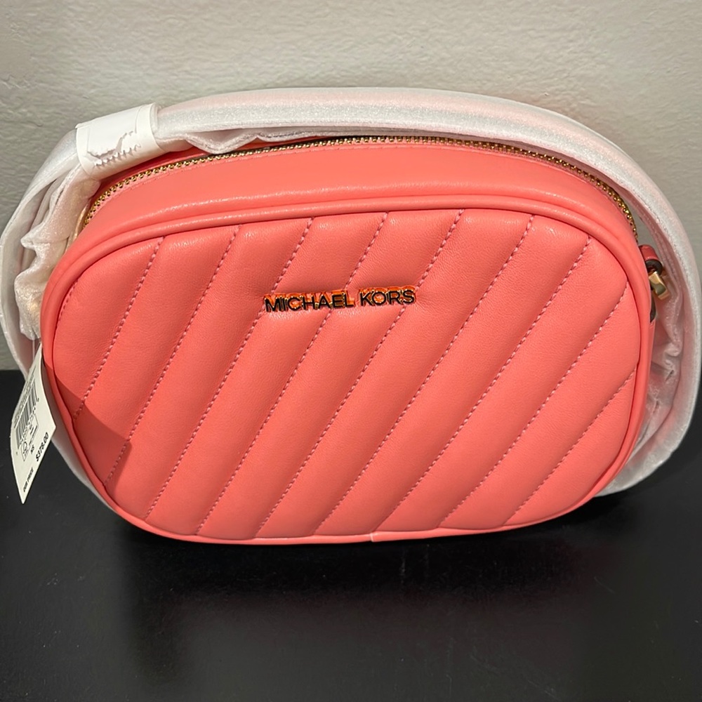 Authentic brand new small Michael Kors x body
